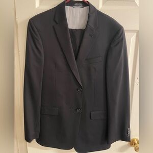 Tommy Hilfiger navy men’s suit. 42 regular. Tailored to fit 6’1, 190 lb male